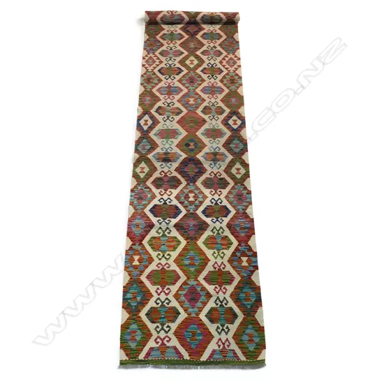 A hand-woven Kelim runner,