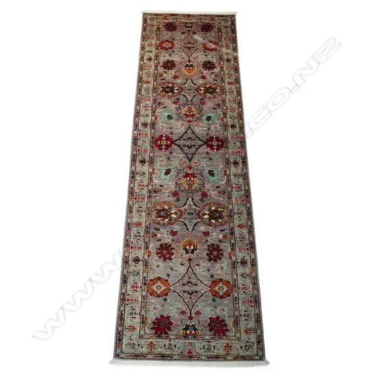 A striking hand-knotted Chobi runner,