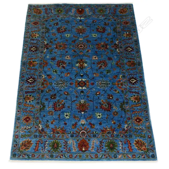 A striking hand-knotted Chobi carpet,