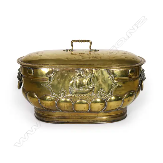 An Arts and Crafts brass lidded coal box,
