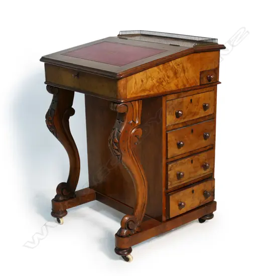 A Victorian walnut Davenport,