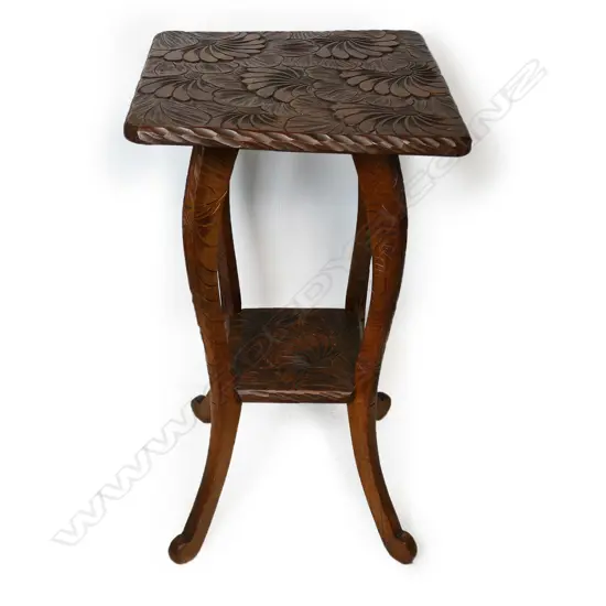 A c.1910 Japanese carved two tier side table,