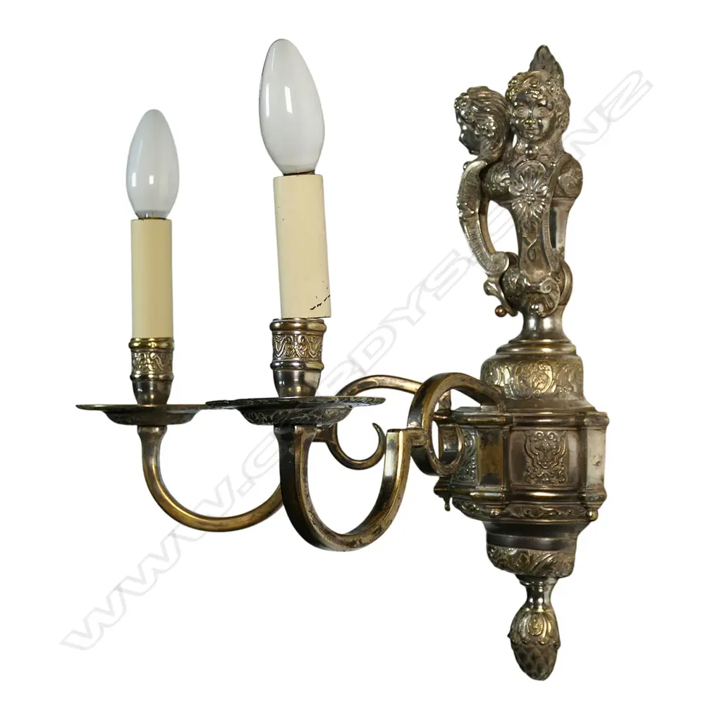 A pair of early 20thC silver plate figural wall sconces, Image 1++