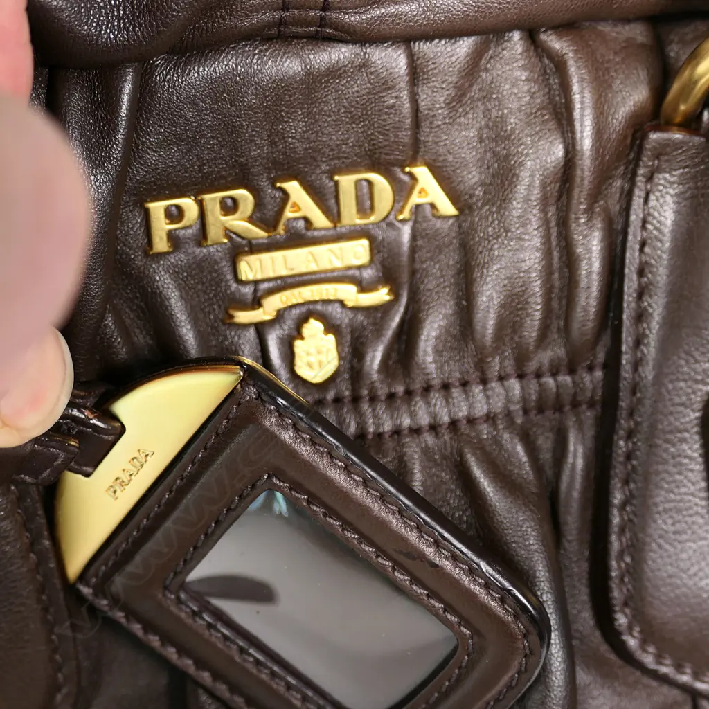 A Prada ruched leather satchel, Image 1++