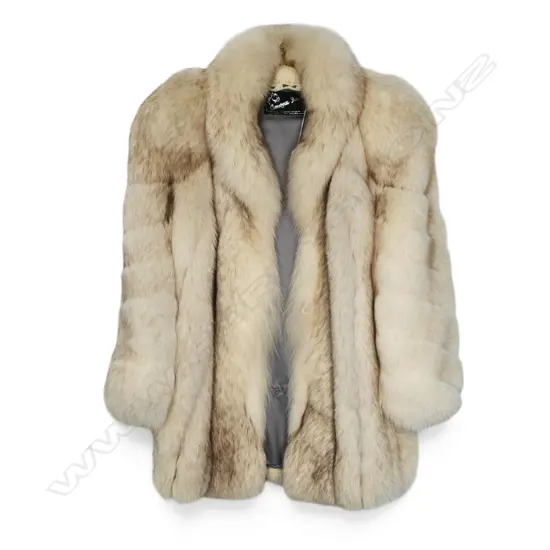 A white fox fur jacket,