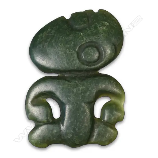 An uncommon early stone tooled small Māori hei tiki,