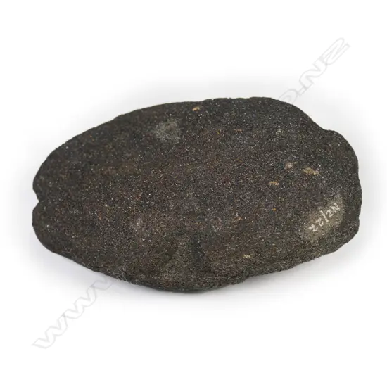 An old Māori sandstone mahe (fishing sinker),