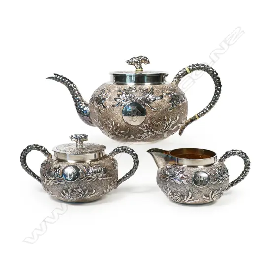 A Wang Hing c.1900 Chinese silver three-piece tea service,
