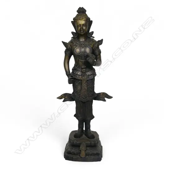 An antique Thai gilt bronze standing guardian spirit,