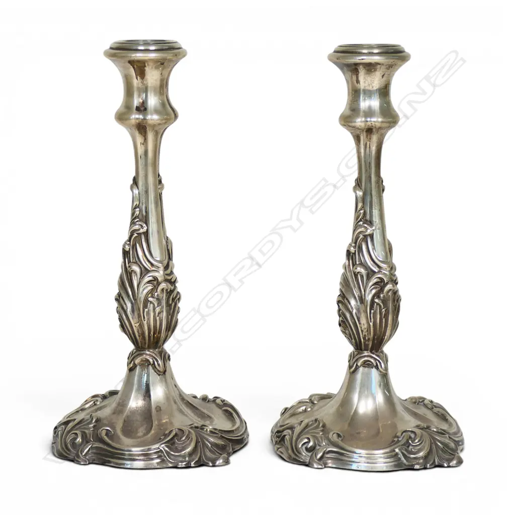 A pair of large loaded silver column candlesticks, Image 1++
