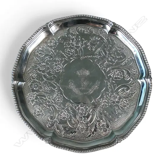 A George III silver floral and scroll embossed salver,