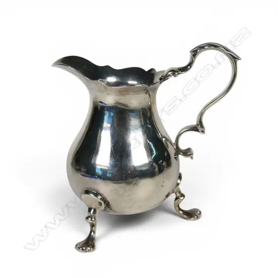 A George II silver baluster cream jug,