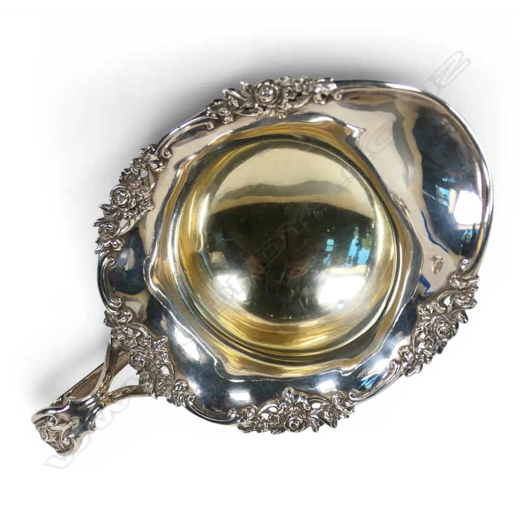 An early 20thC silver milk jug, Image 1++