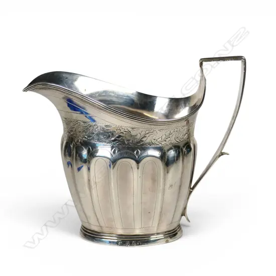 A George III silver flat bottom cream jug,