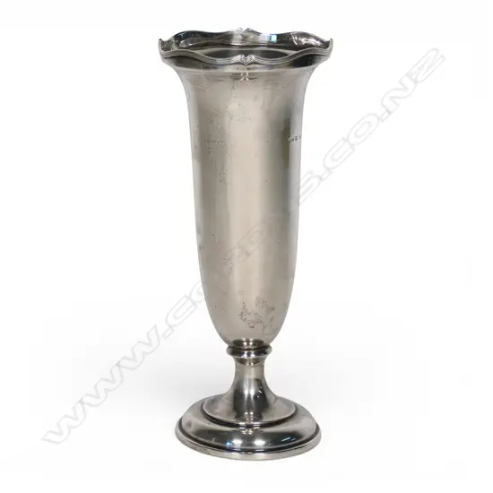 A tall silver trumpet vase,