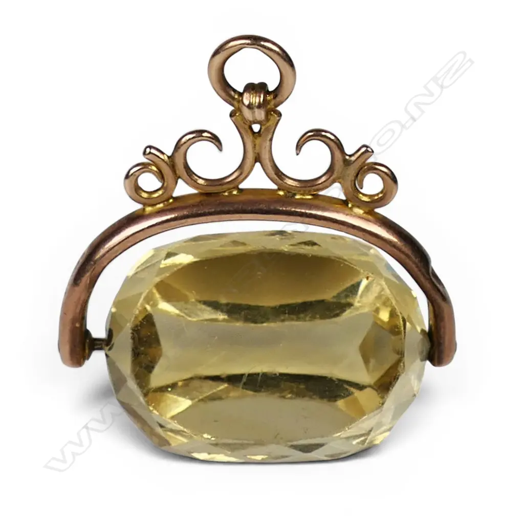 An Edwardian 9ct rose gold and citrine fob spinner, Image 1++