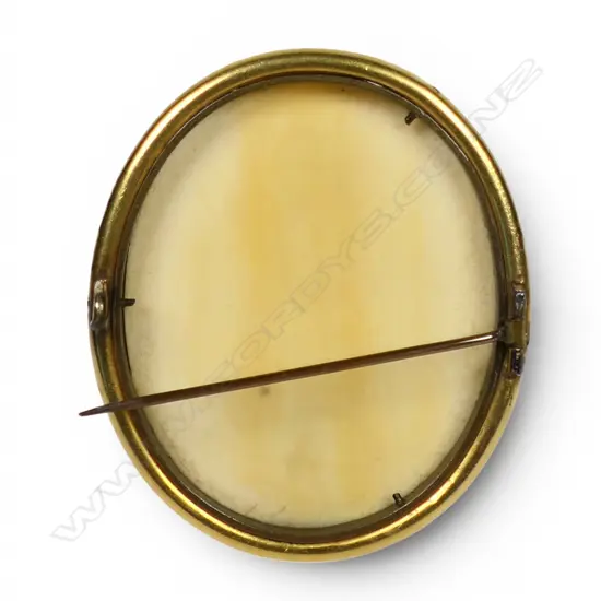 A 19thC deeply floral carved ivory large brooch,