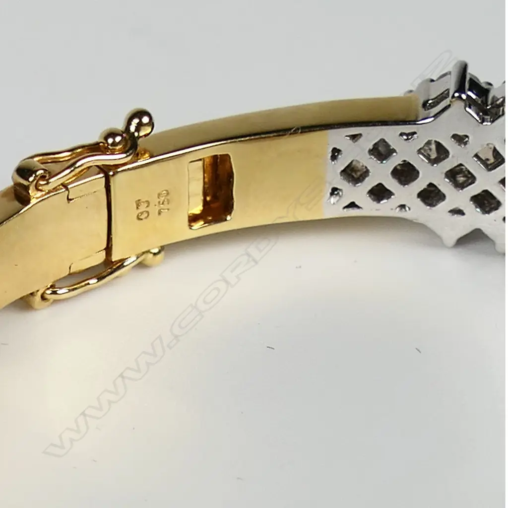 An impressive 18ct-tone gold and multi diamond hinged bangle, Image 1++