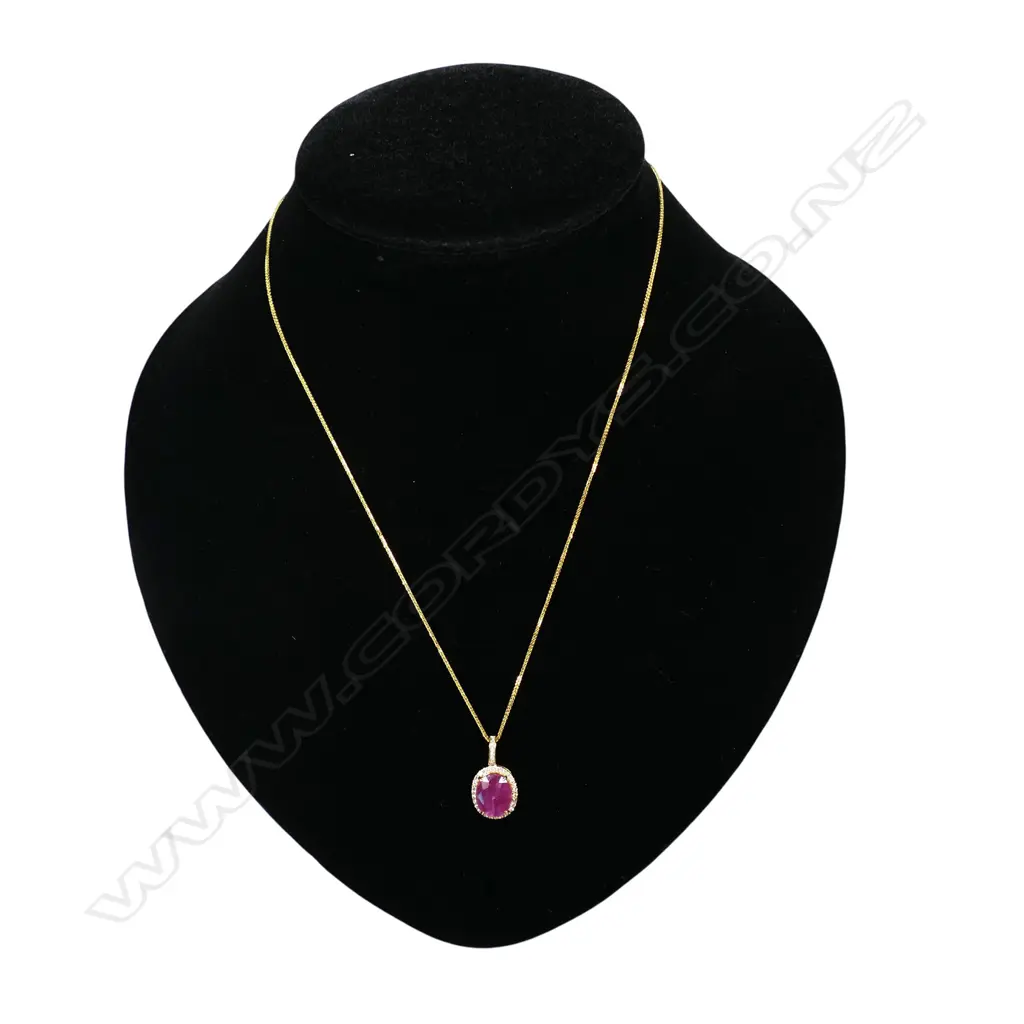 A 9ct gold ruby and diamond pendant necklace, Image 1++