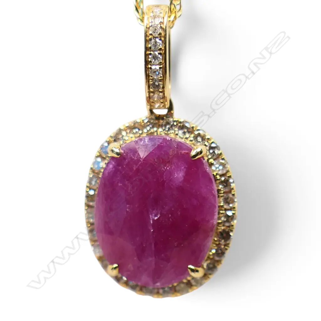 A 9ct gold ruby and diamond pendant necklace, Image 1++