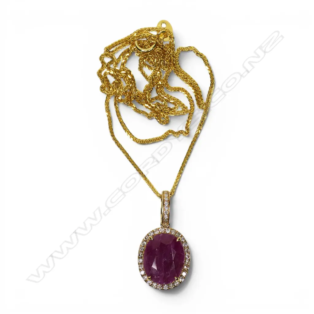 A 9ct gold ruby and diamond pendant necklace, Image 1++