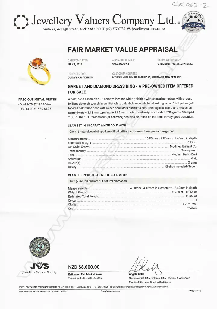 An 18ct yellow and white gold orange garnet and diamond dress ring, Image 1++