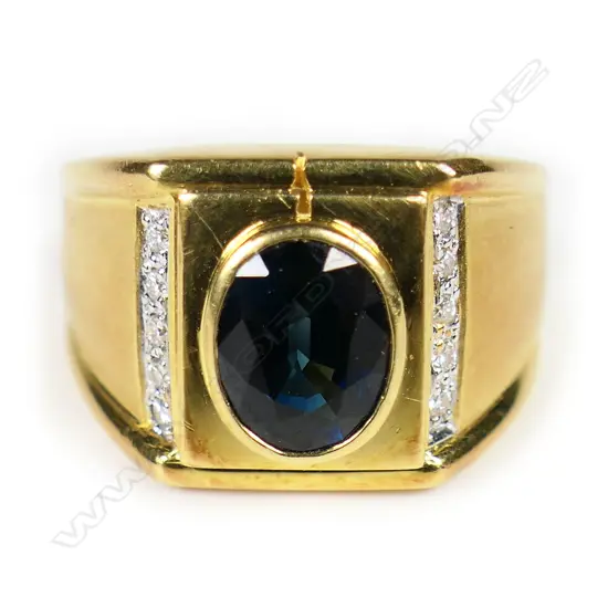 An 18ct yellow gold sapphire and diamond signet type ring,