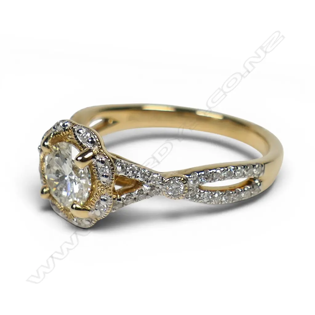 A 14ct gold and diamond ornate halo ring, Image 1++