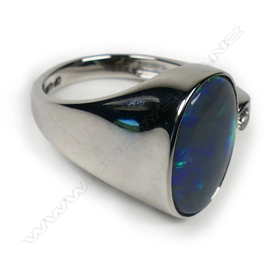 A 14ct white gold opal and diamond ring, Image 1++