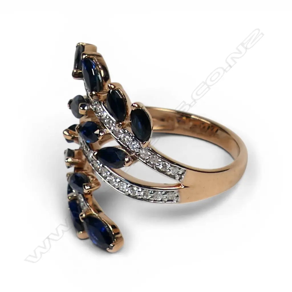 A 14ct rose gold sapphire and diamond fern style ring, Image 1++
