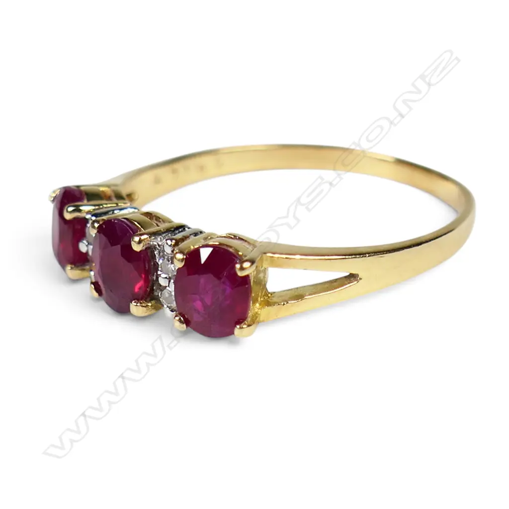 An 18ct yellow gold ruby and diamond ring, Image 1++