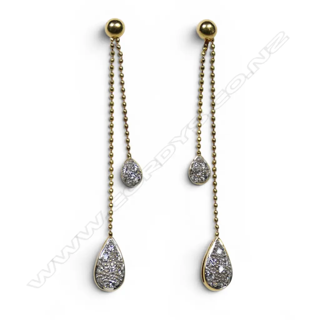 A pair of 18ct gold and diamond drop earrings, Image 1++