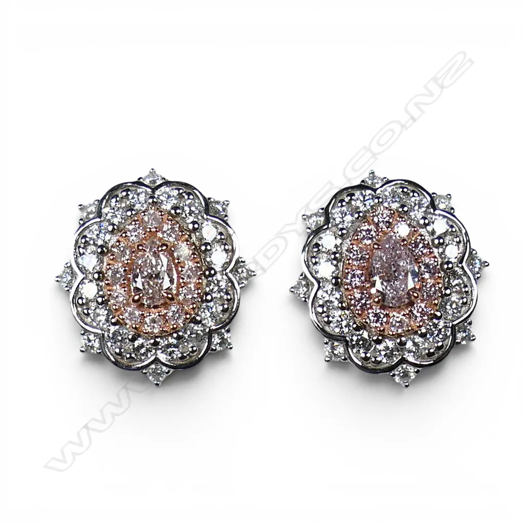 A pair of 14ct white and rose gold diamond halo stud earrings, Image 1++