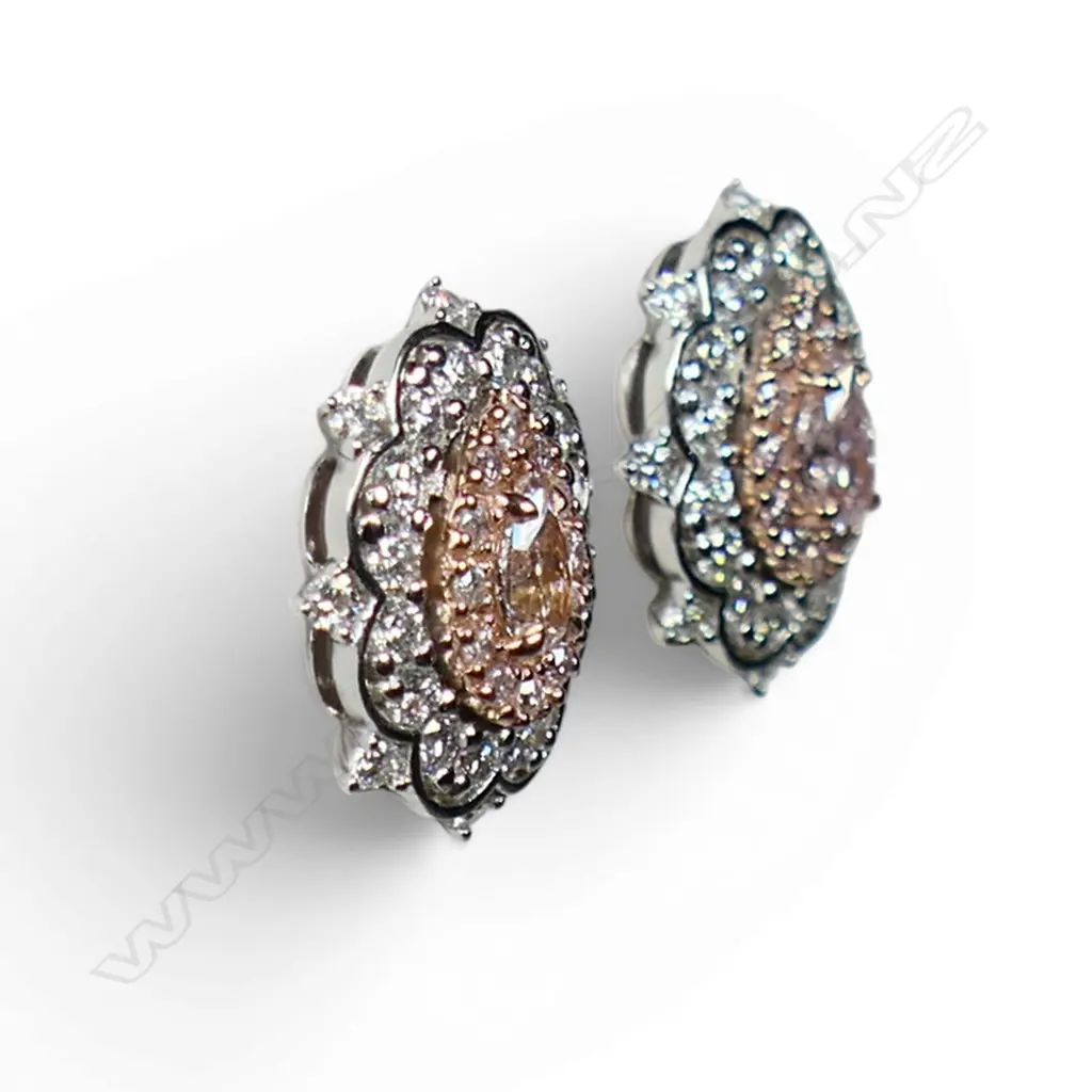 A pair of 14ct white and rose gold diamond halo stud earrings, Image 1++