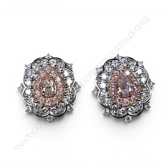 A pair of 14ct white and rose gold diamond halo stud earrings,