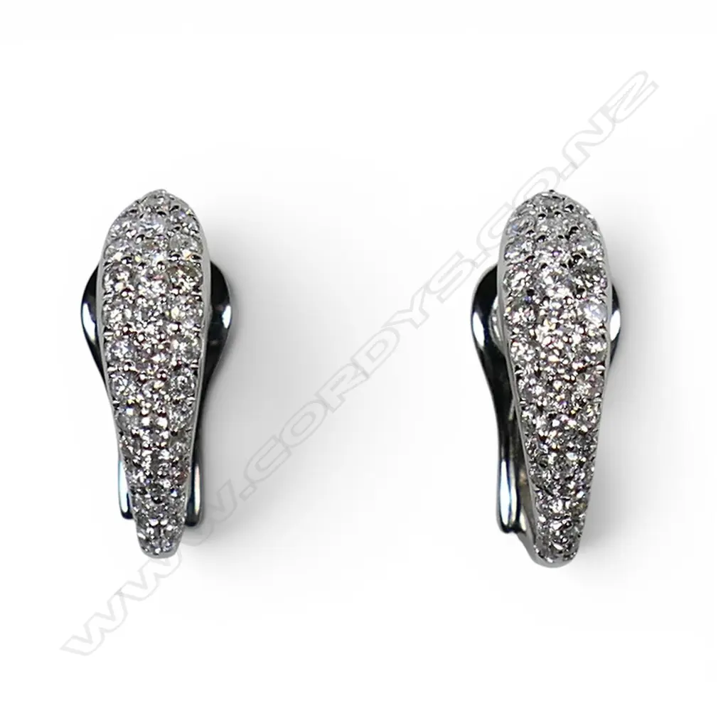 A pair of 18ct white gold and diamond earrings, Image 1++