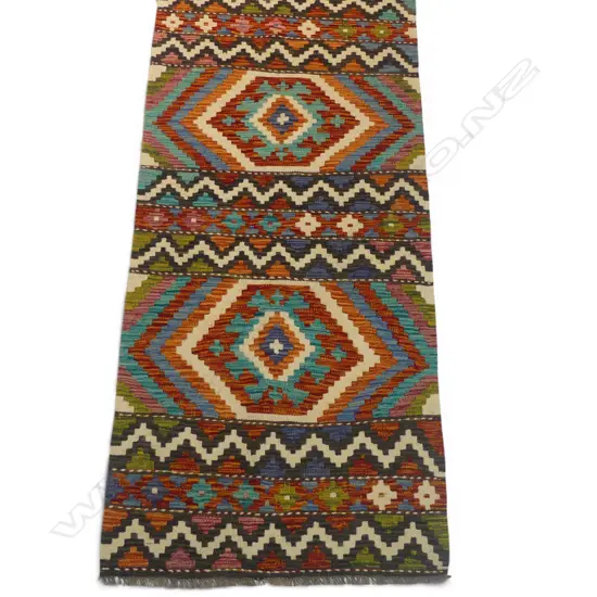 A hand woven Kilim runner,