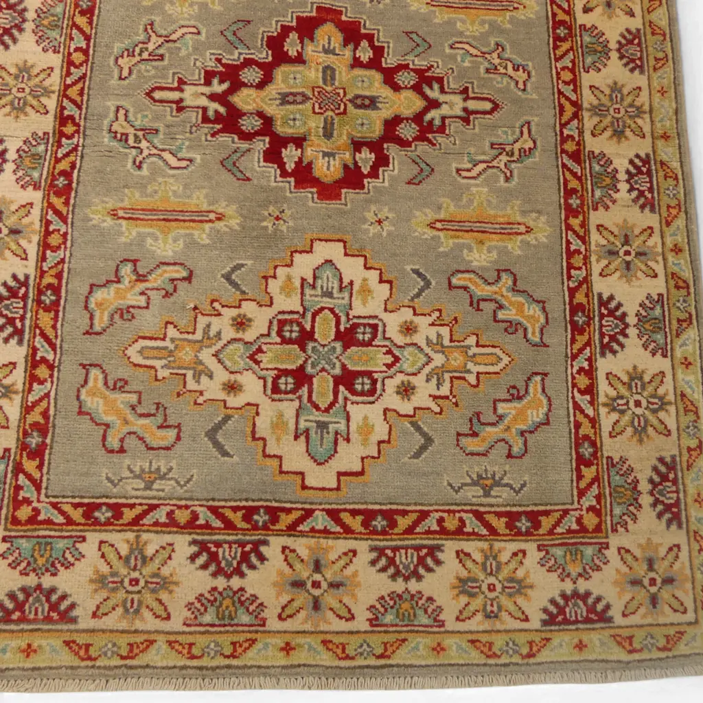 A hand-knotted Kazak rug, Image 1++