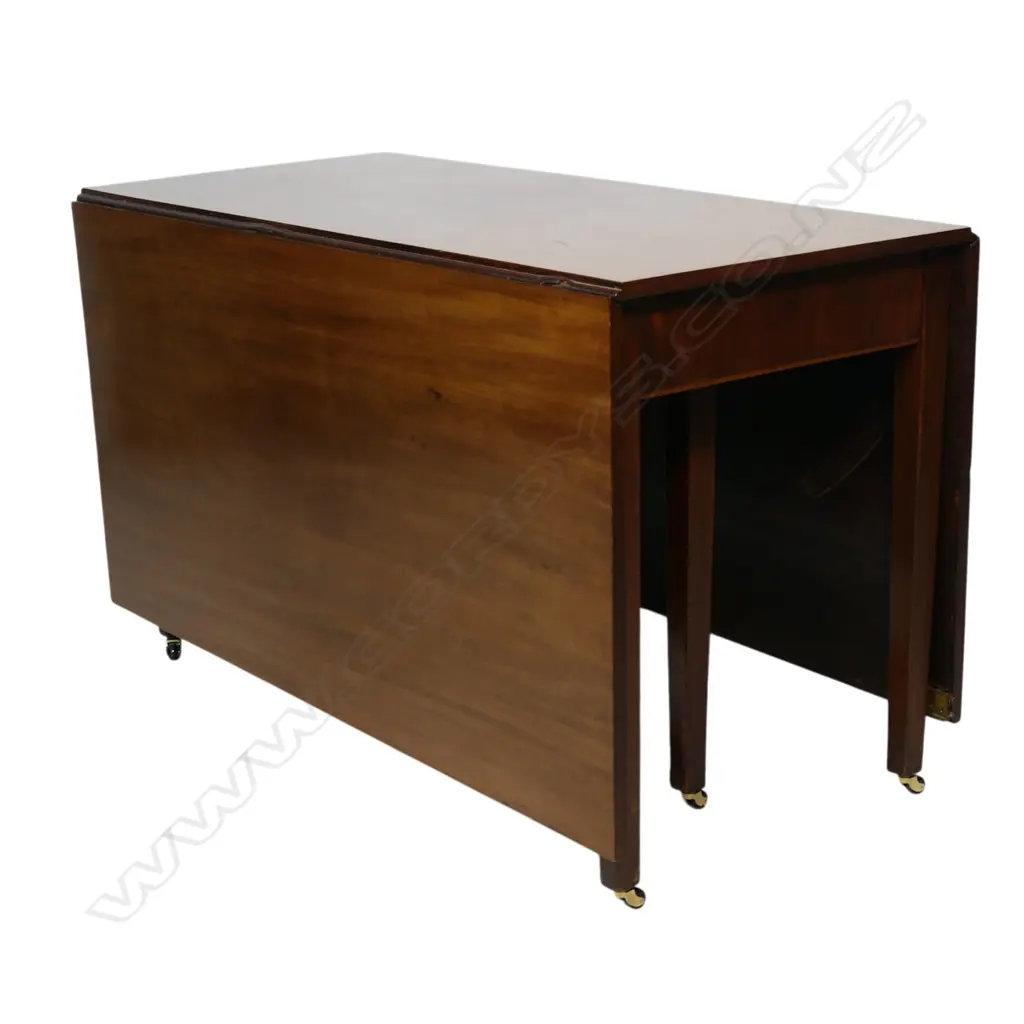 A George III three-section D-end mahogany extension banquet dining table, Image 1++