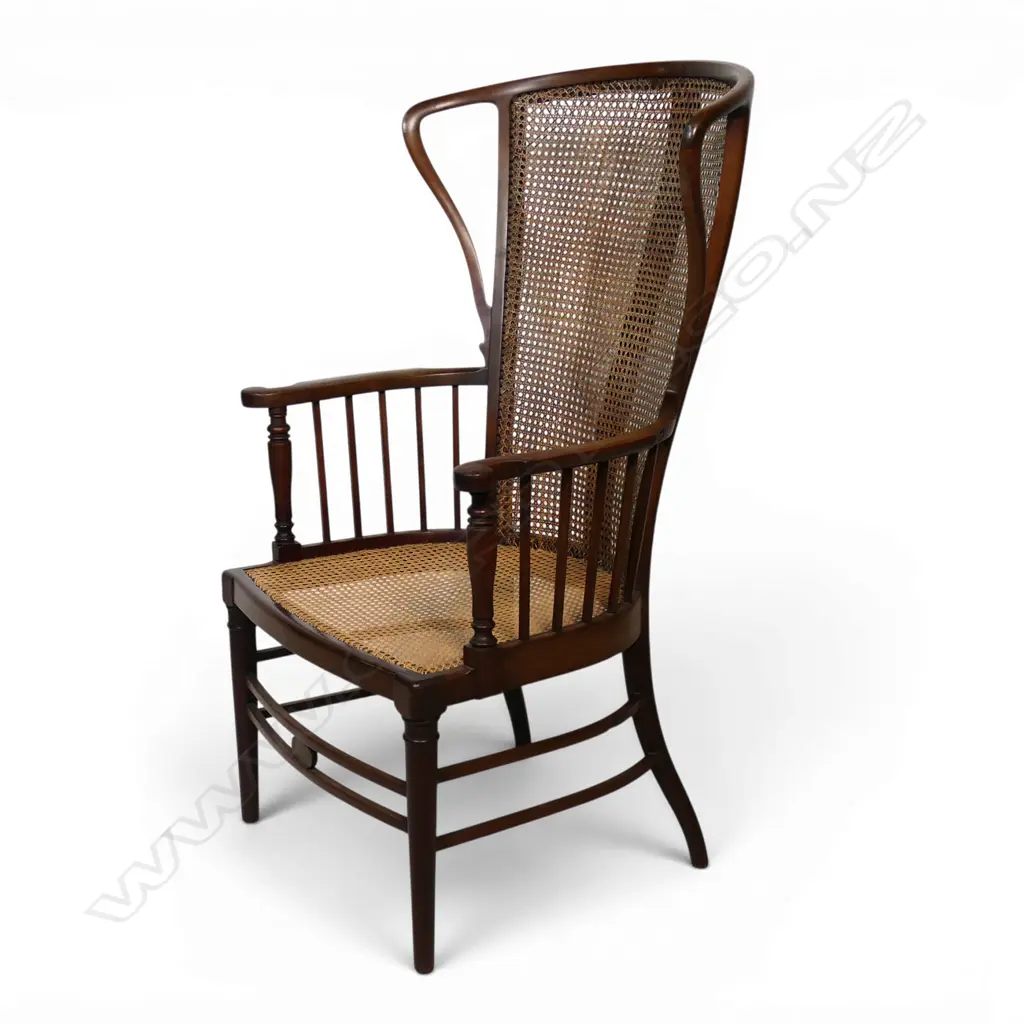 An Edwardian Wycombe cane wing back chair, Image 1++