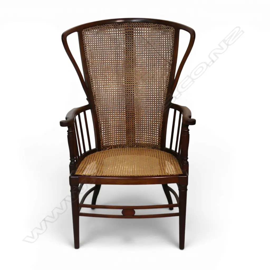 An Edwardian Wycombe cane wing back chair, Image 1++