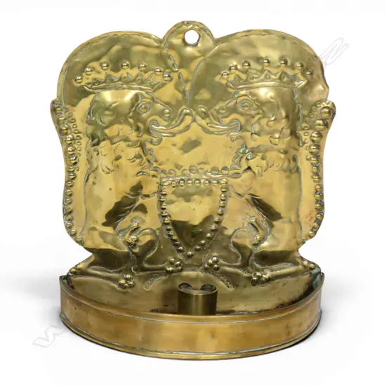 A Dutch 18thC brass candle sconce,