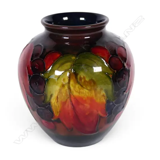 A William Moorcroft flambé Leaf and Berry vase,