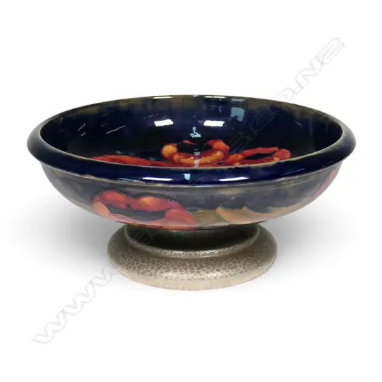 A William Moorcroft ‘Poppy' bowl on Tudric pewter pedestal base,