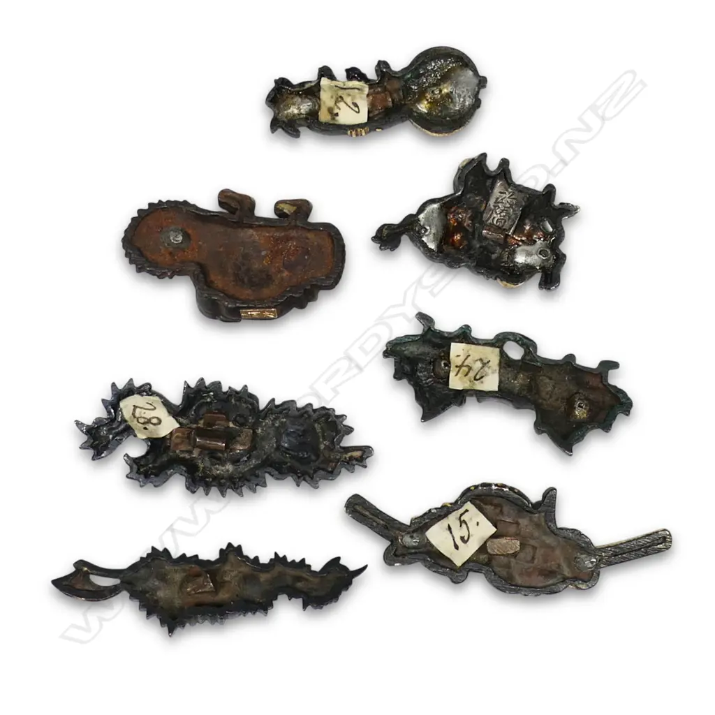A collection of seven Japanese menuki, Image 1++