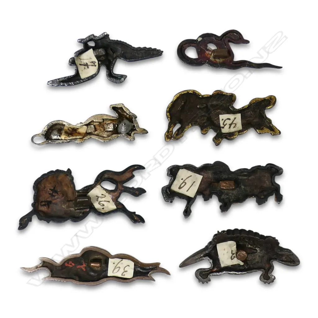 A collection of eight Japanese menuki, Image 1++