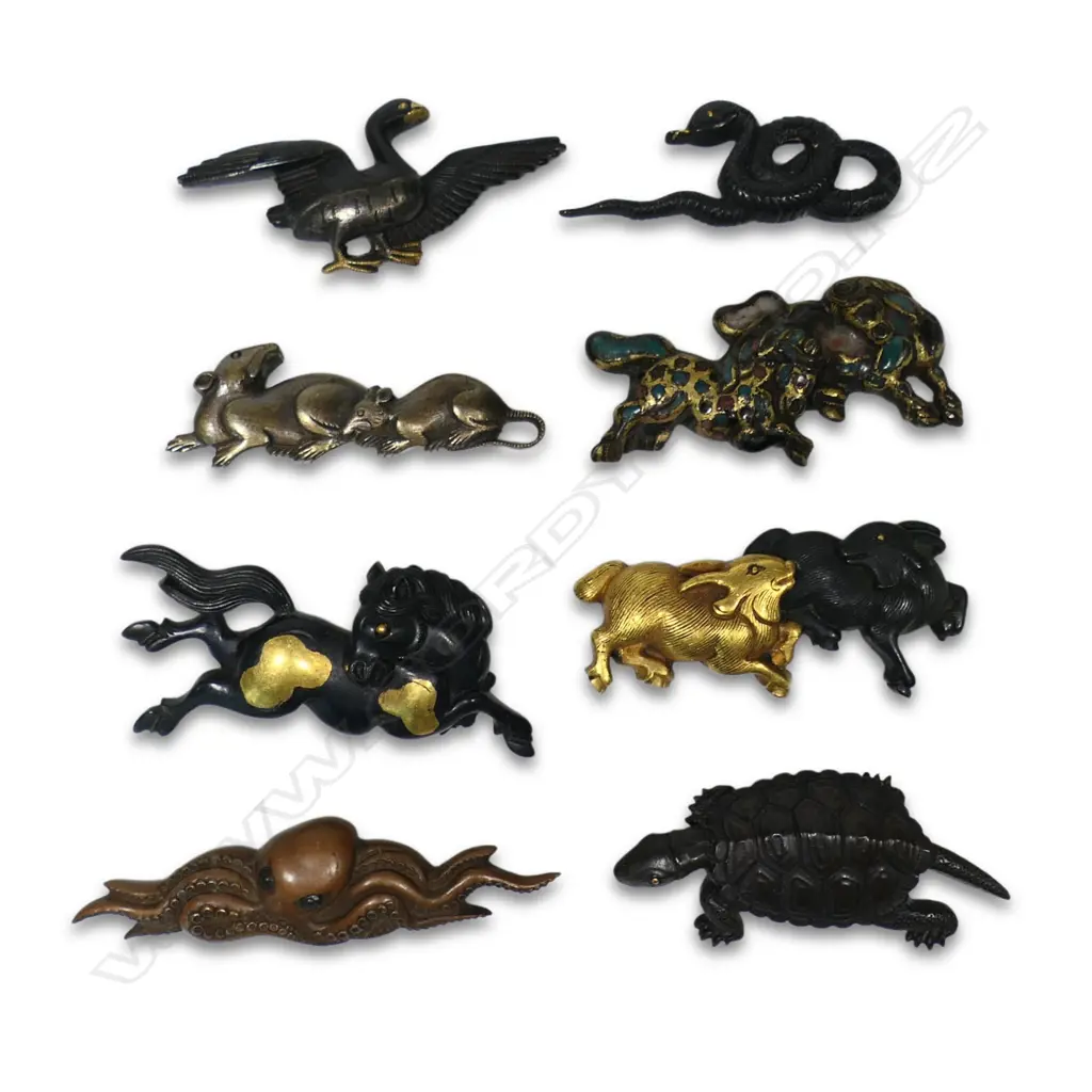 A collection of eight Japanese menuki, Image 1++