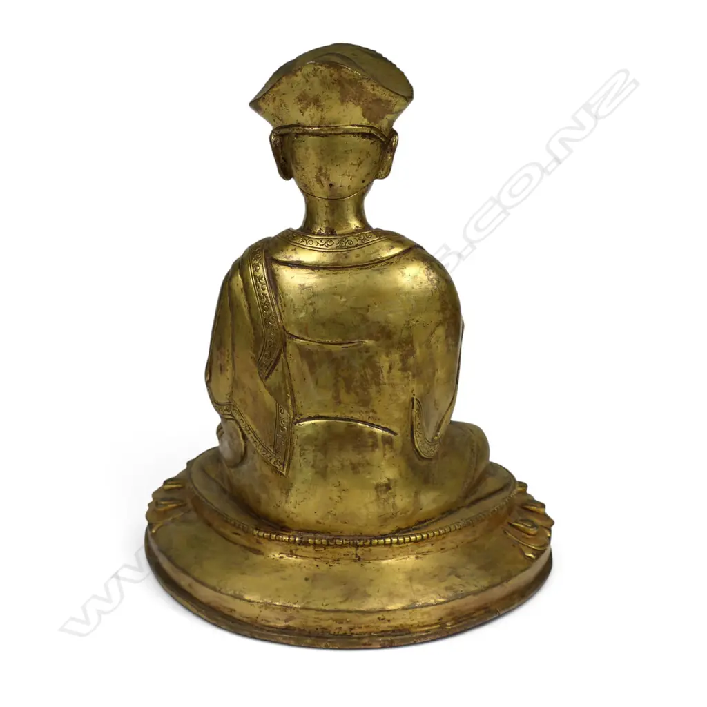 An Oriental gilt bronze buddha, Image 1++