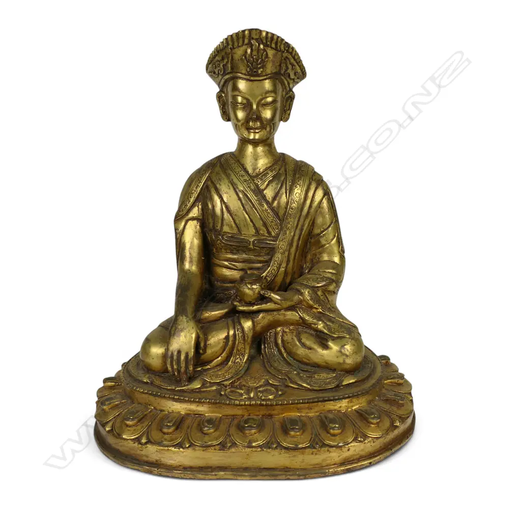 An Oriental gilt bronze buddha, Image 1++
