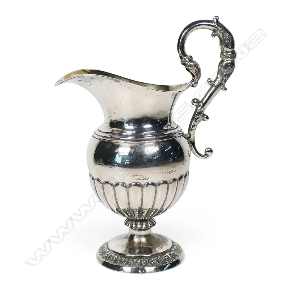 An early 19thC Continental .750 standard silver cream jug, Image 1++